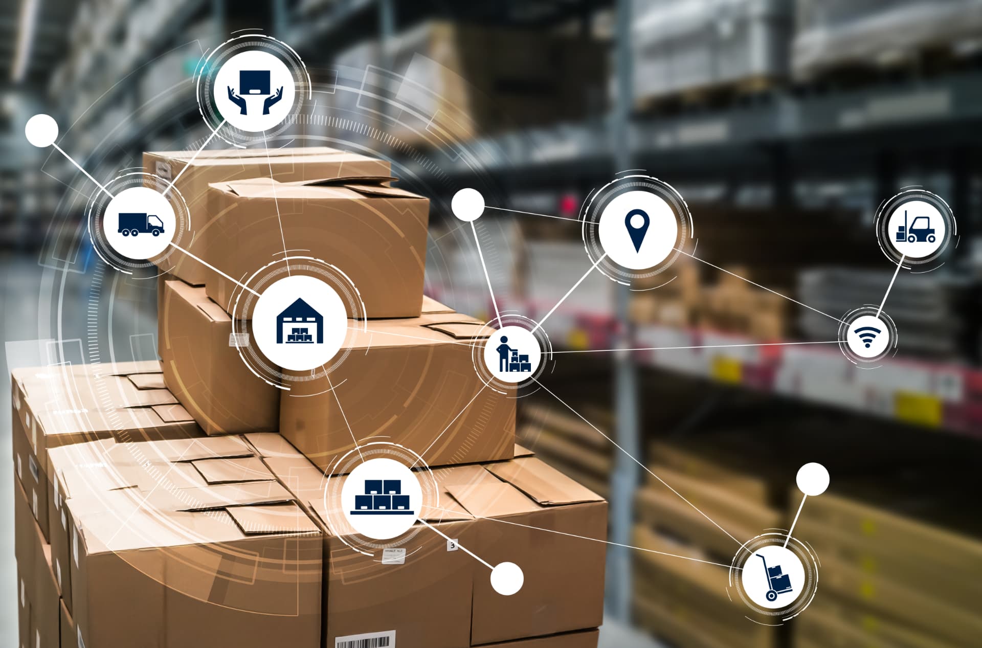 Logistics support team tracking shipments on office screens